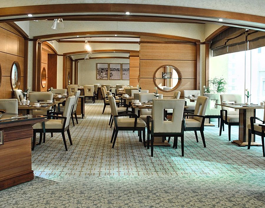 Wiseman Grand Hotel Doha Bagian luar foto The interior of the restaurant