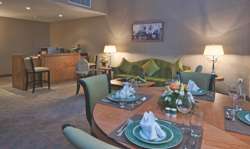 Wiseman Grand Hotel Doha Bagian luar foto Suite