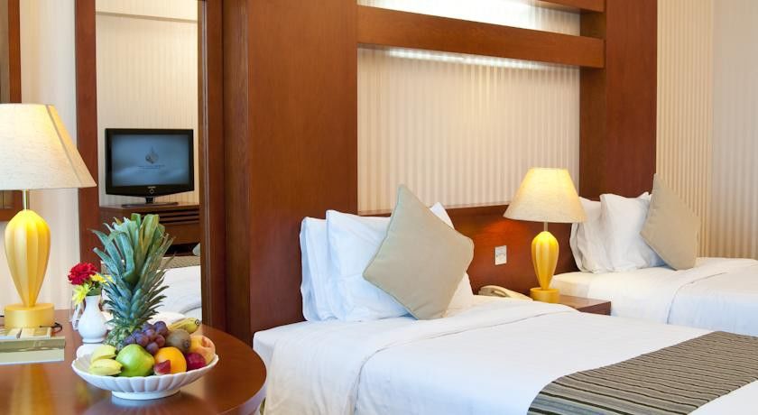 Wiseman Grand Hotel Doha Bagian luar foto A room at the hotel